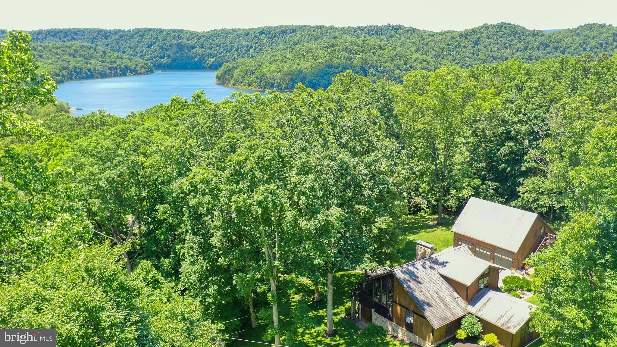 168 Cherry Tree Road Addison, PA 15411 - Photo 3 of 42 a view of a house with a yard