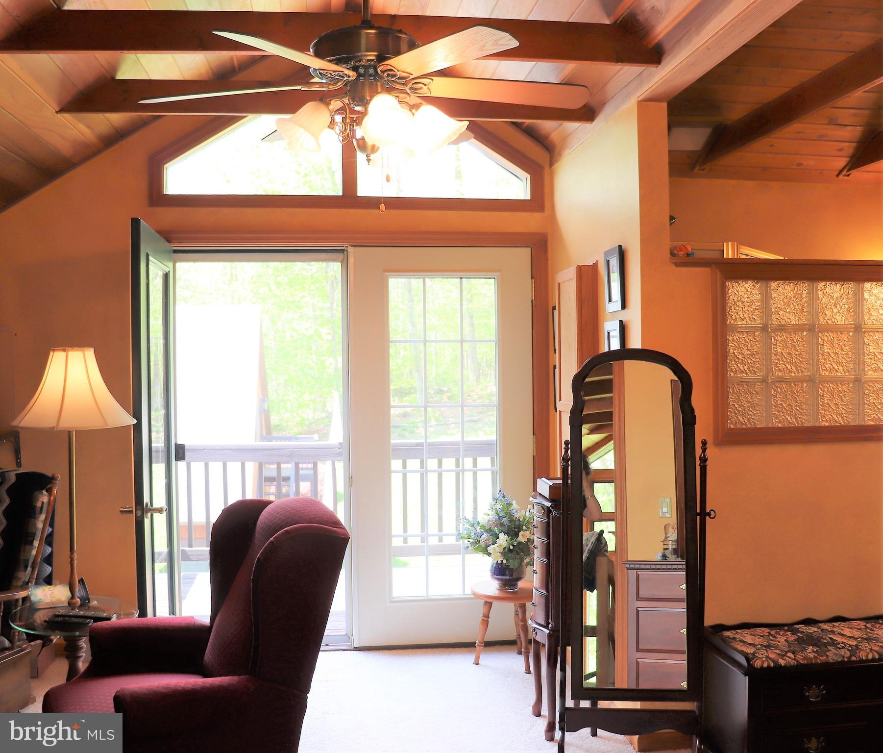 168 Cherry Tree Road Addison, PA 15411 - Photo 23 of 42 a view of a livingroom with furniture and a window