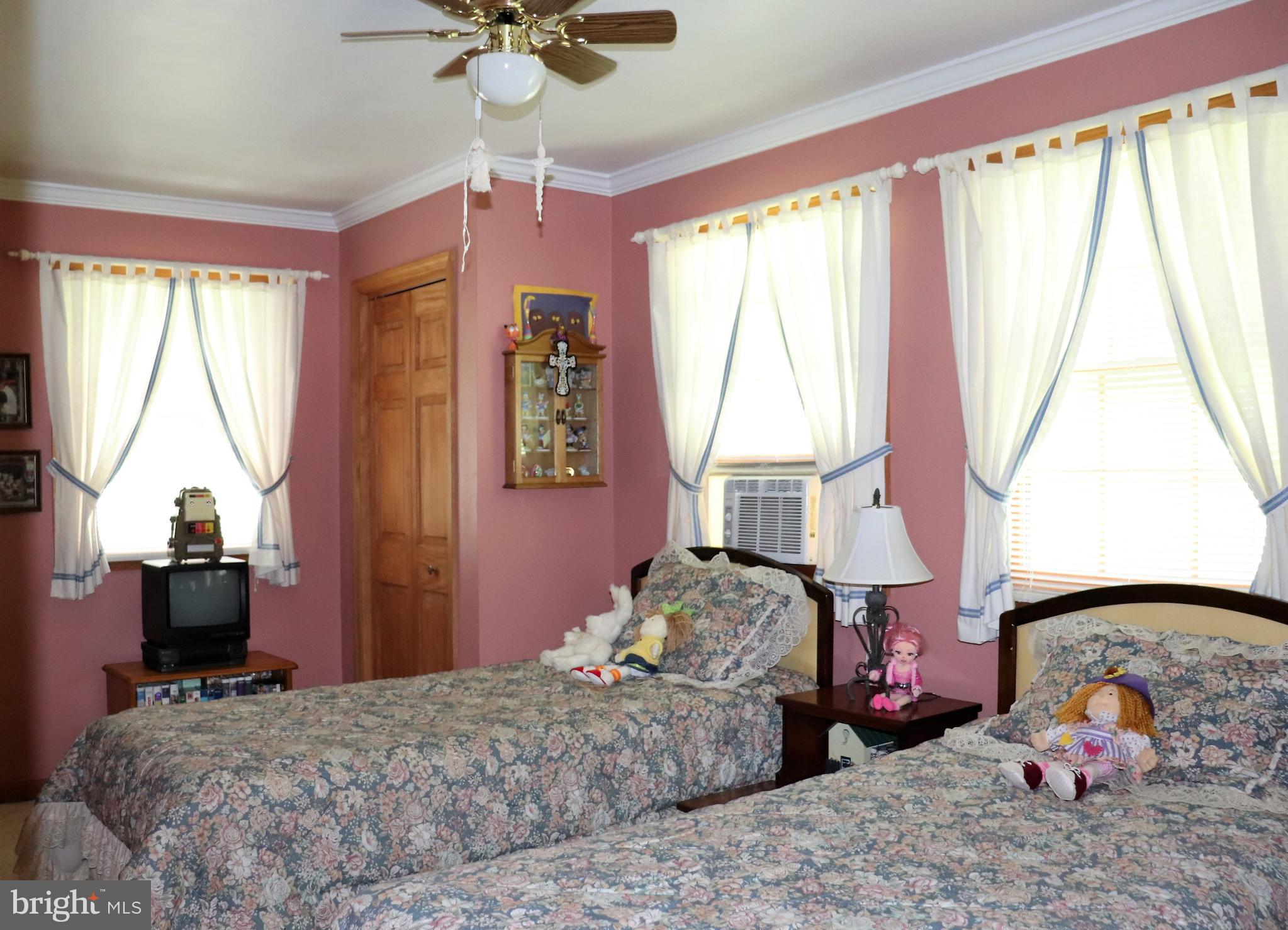 168 Cherry Tree Road Addison, PA 15411 - Photo 28 of 42 a bedroom with a bed and a window