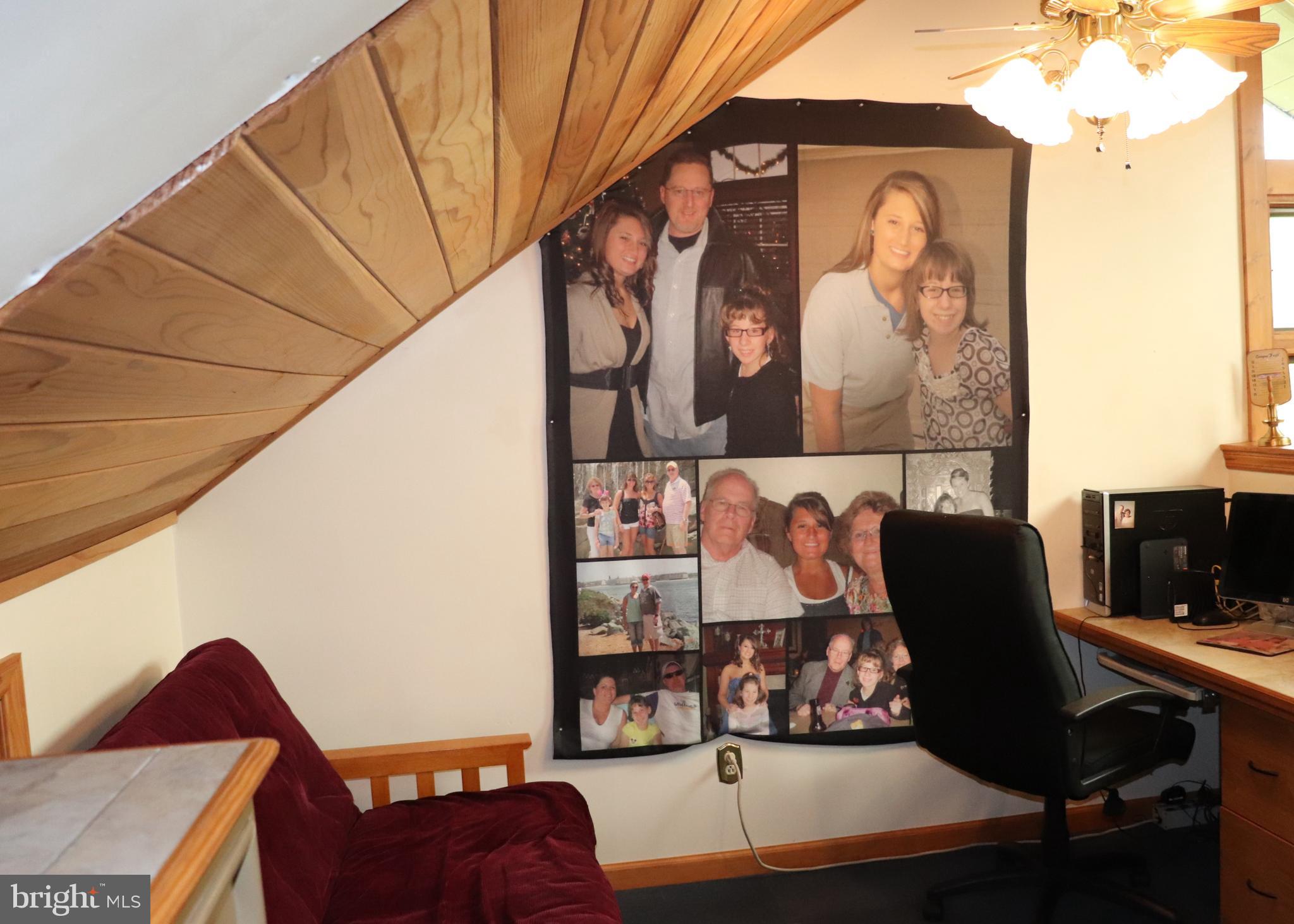 168 Cherry Tree Road Addison, PA 15411 - Photo 32 of 42 a living room with furniture and wooden floor