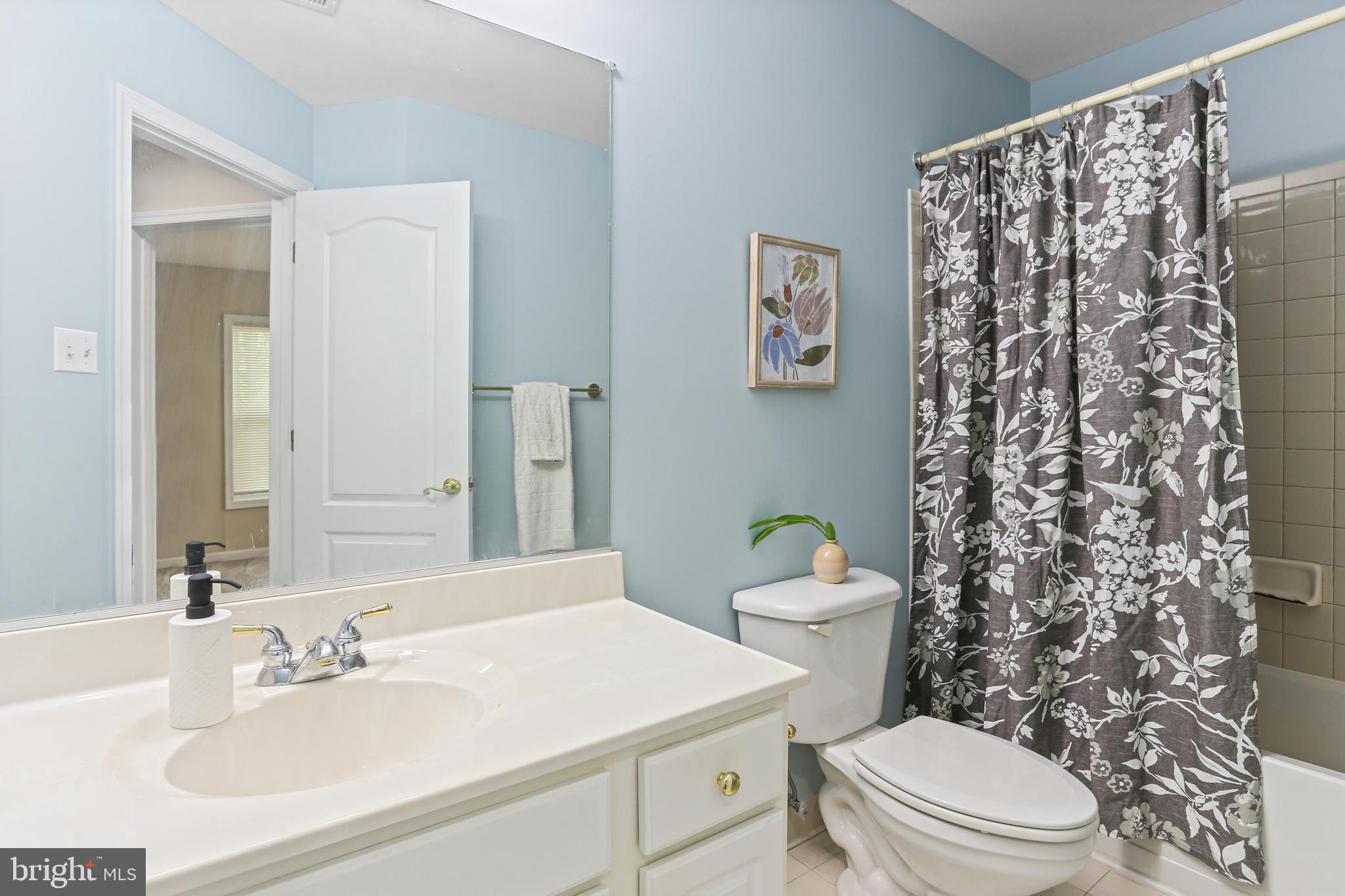 10232 Rutland Round Road, Unit 24 Columbia, MD 21044 - Photo 23 of 31 a bathroom with a sink toilet and shower