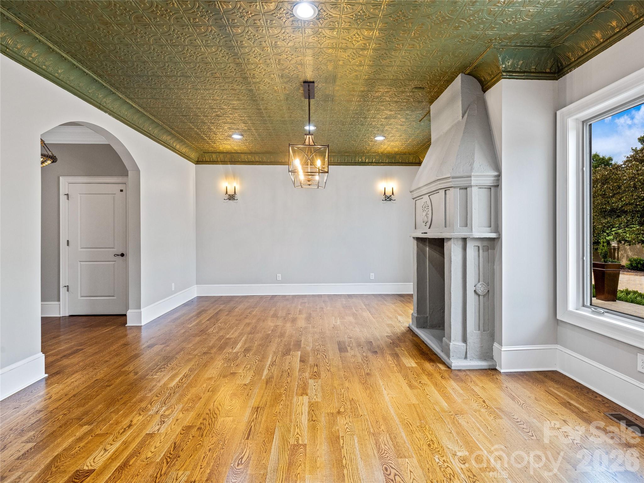 1090 Pearidge Road Bostic, NC 28018 - Photo 16 of 47 a view of empty room with wooden floor and fan