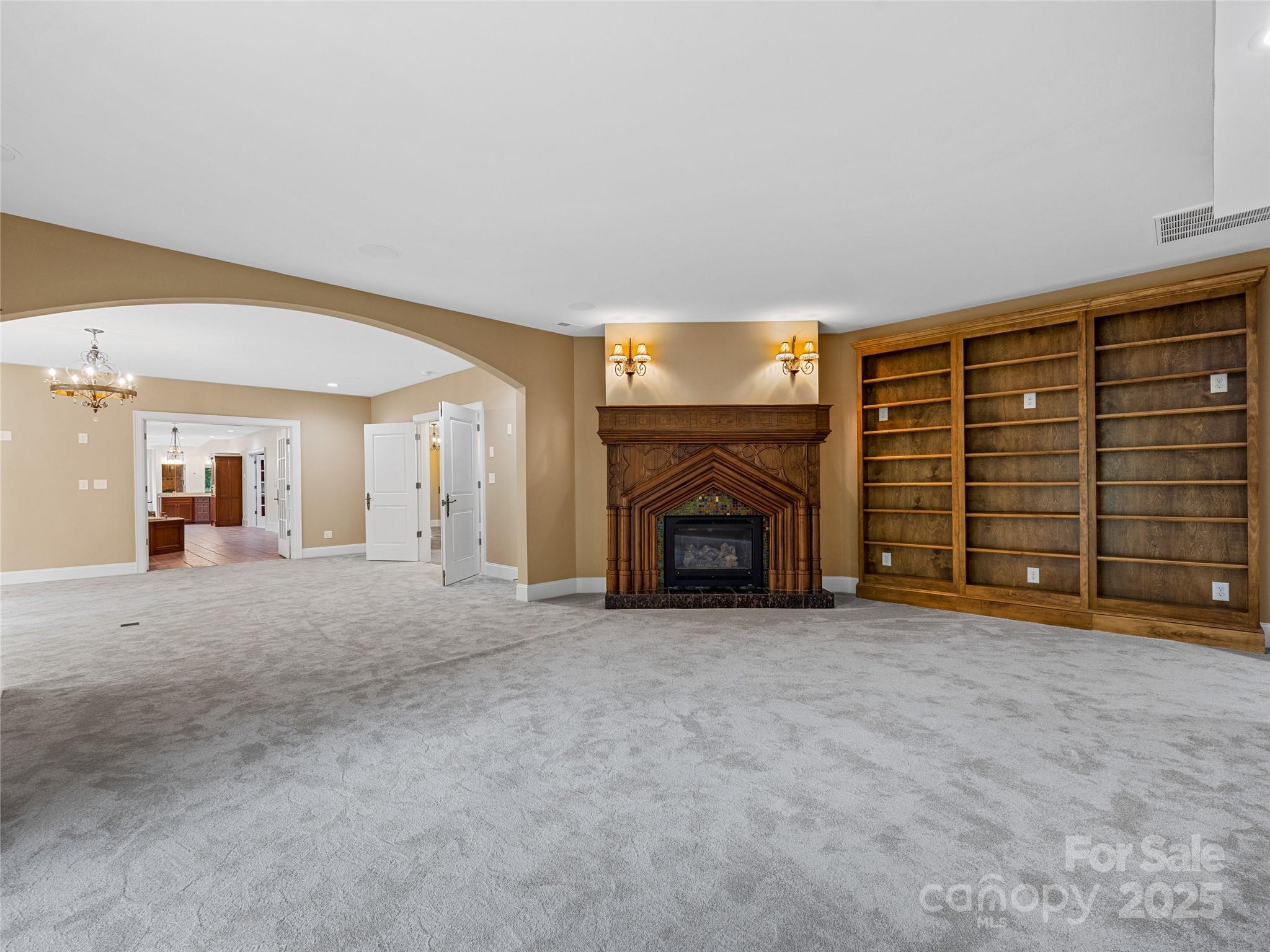 1090 Pearidge Road Bostic, NC 28018 - Photo 25 of 47 an empty room with furniture and a fireplace
