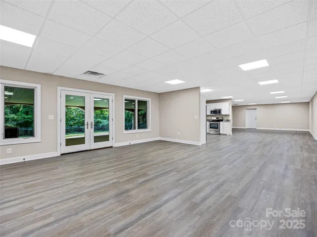 a bathroom with a sink double vanity and a mirror