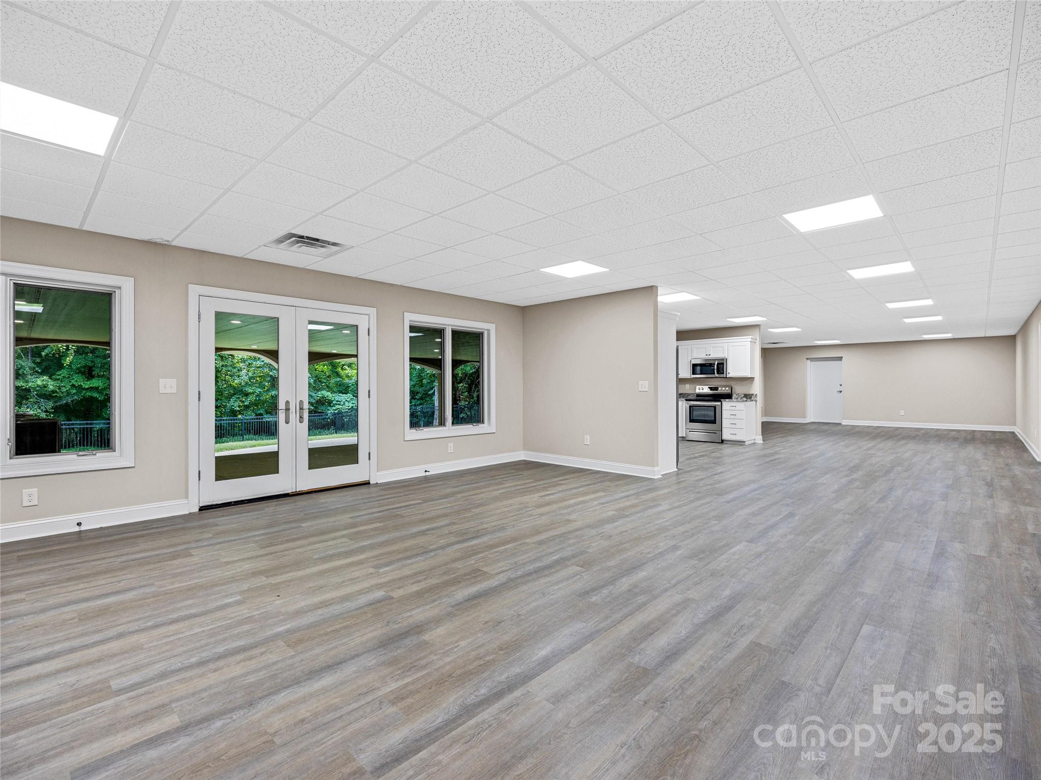 1090 Pearidge Road Bostic, NC 28018 - Photo 42 of 47 a view of an empty room with wooden floor and a window