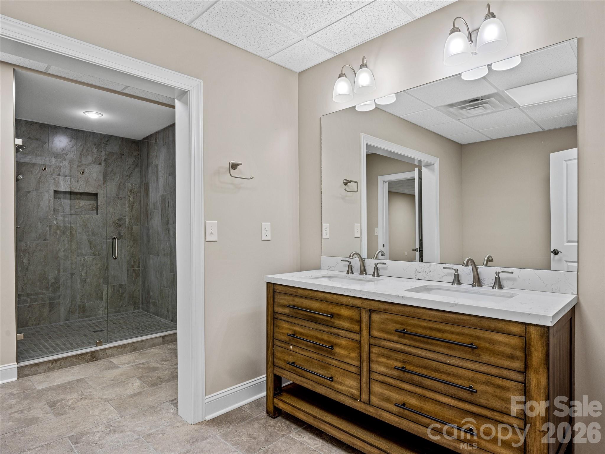 1090 Pearidge Road Bostic, NC 28018 - Photo 44 of 47 a bathroom with a sink double vanity and a mirror