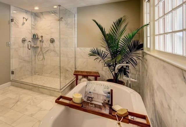 a view of a bathroom with a tub