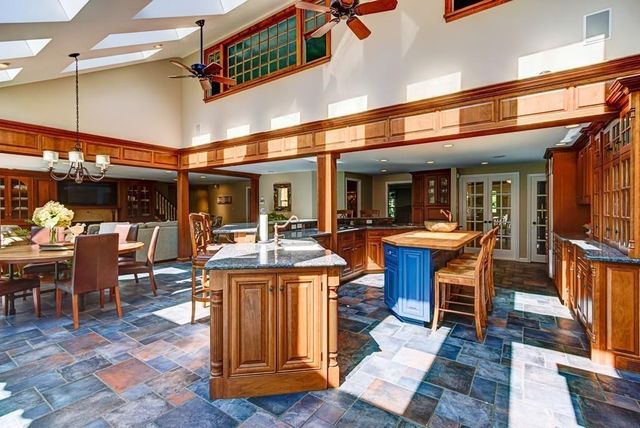 a view of the patio with dining table and chairs