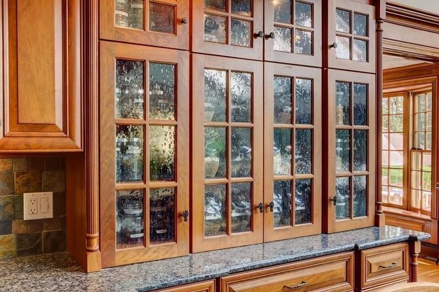 a view of a brick building with a window and a door