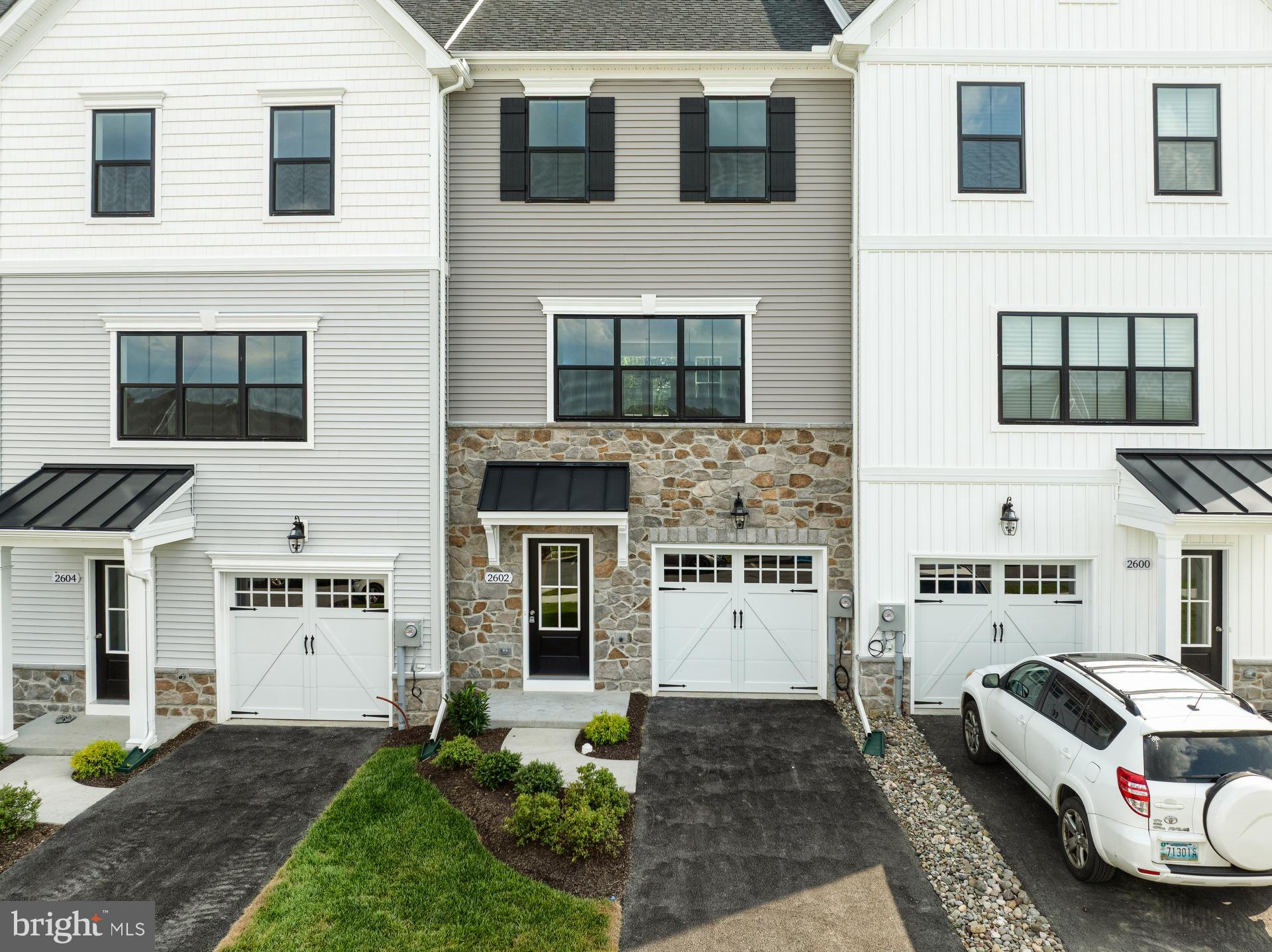 2609 Front Shed Drive Frederick, MD 21702 - Photo 39 of 78 a front view of a house with a yard