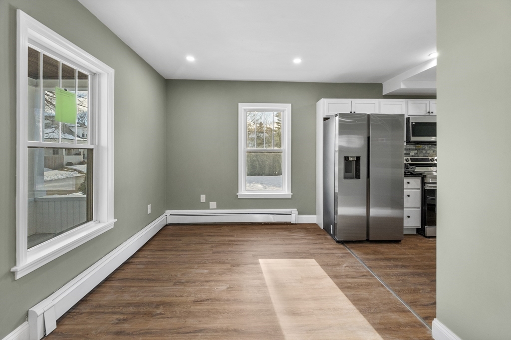 5 Lombard Avenue Athol, MA 01331 - Photo 12 of 40 a view of an empty room with wooden floor and a window