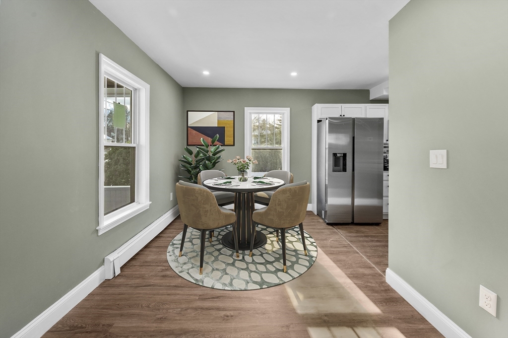 5 Lombard Avenue Athol, MA 01331 - Photo 13 of 40 a dining room with furniture a window and wooden floor