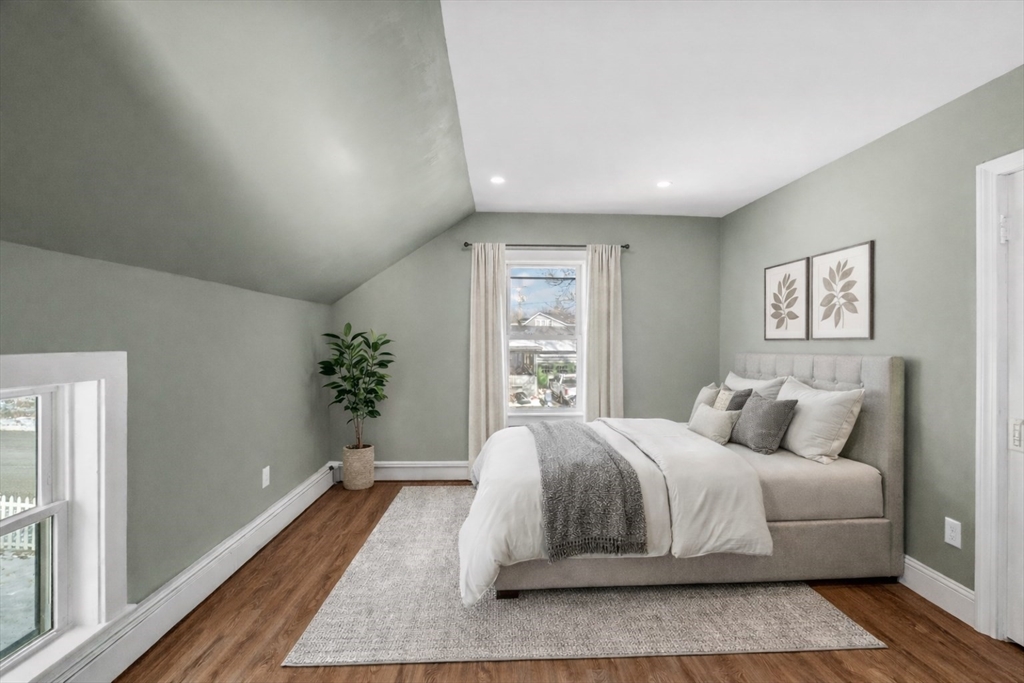5 Lombard Avenue Athol, MA 01331 - Photo 23 of 40 a bedroom with a large bed and a wooden floor