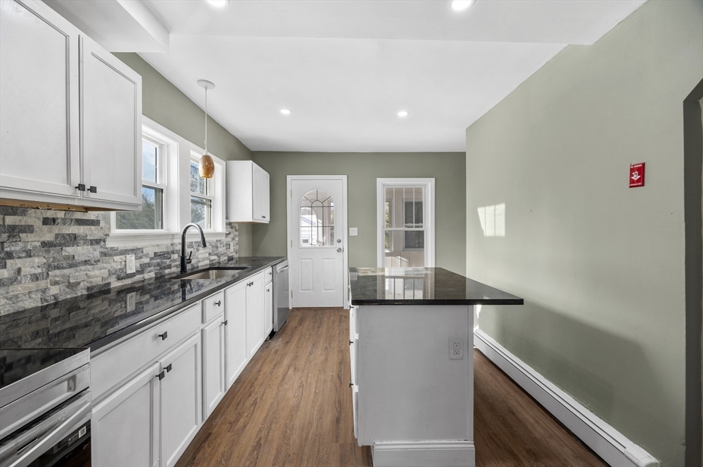 5 Lombard Avenue Athol, MA 01331 - Photo 8 of 40 a kitchen with granite countertop a sink and cabinets