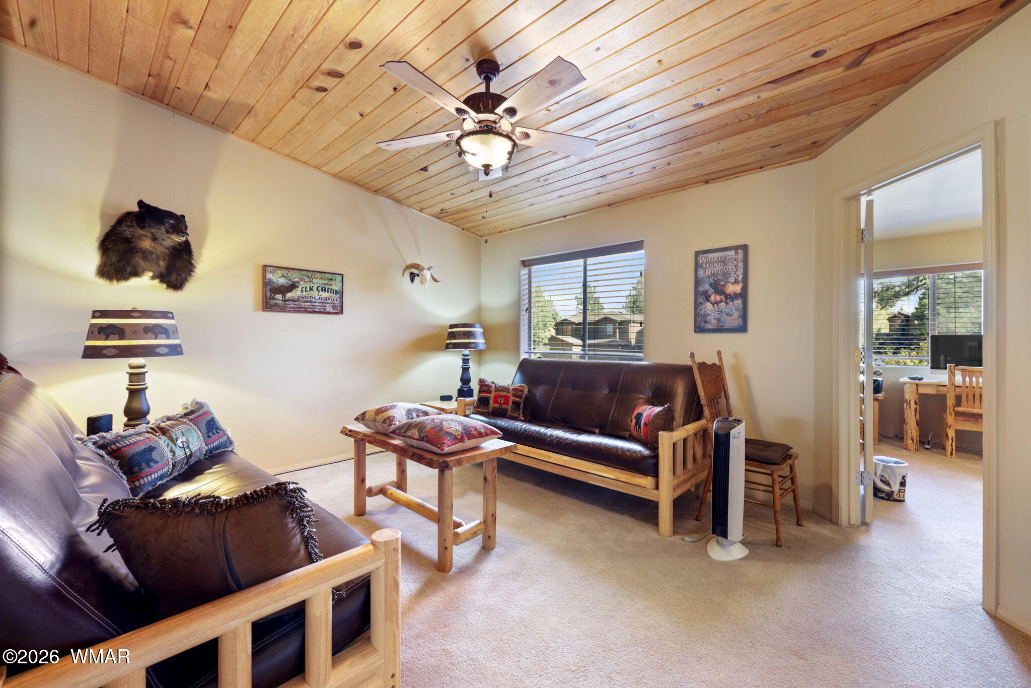6998 Starlight Ridge Road, Unit LOT 36 Lakeside, AZ 85929 - Photo 6 of 27 a living room with furniture a chandelier and a window