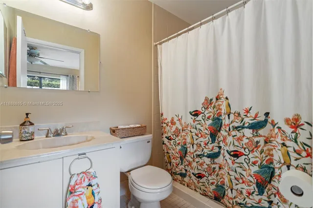 a bathroom with a toilet and a sink