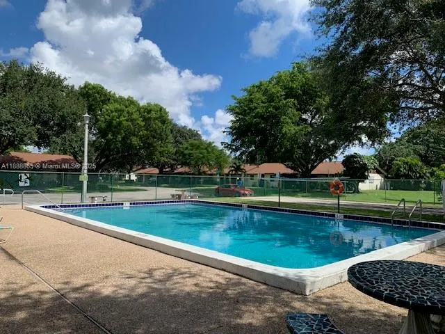 a view of a lake with a yard