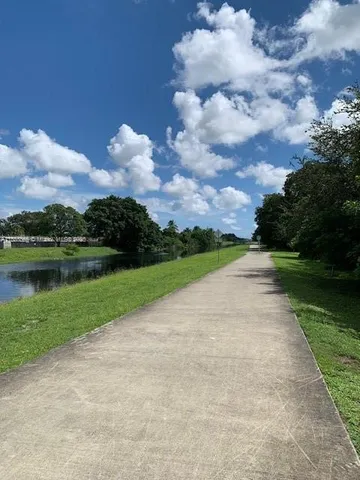 a view of a garden with a lake