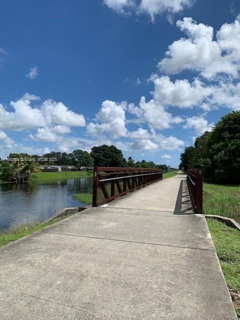 6710 South Parkway Drive, Unit 311 Margate, FL 33068 - Photo 31 of 31 a view of a lake with a city