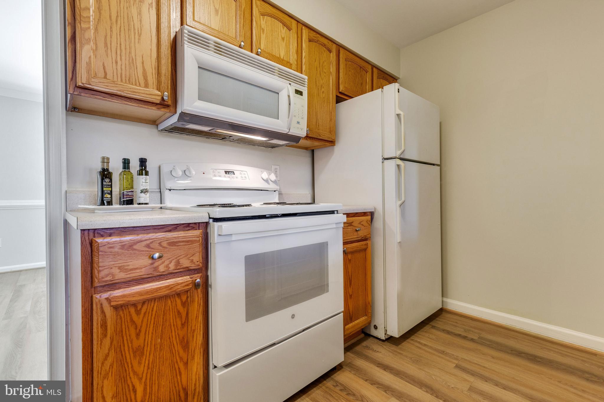 14577 Golden Oak Road Centreville, VA 20121 - Photo 12 of 36 Pantry located opposite the refrigerator.