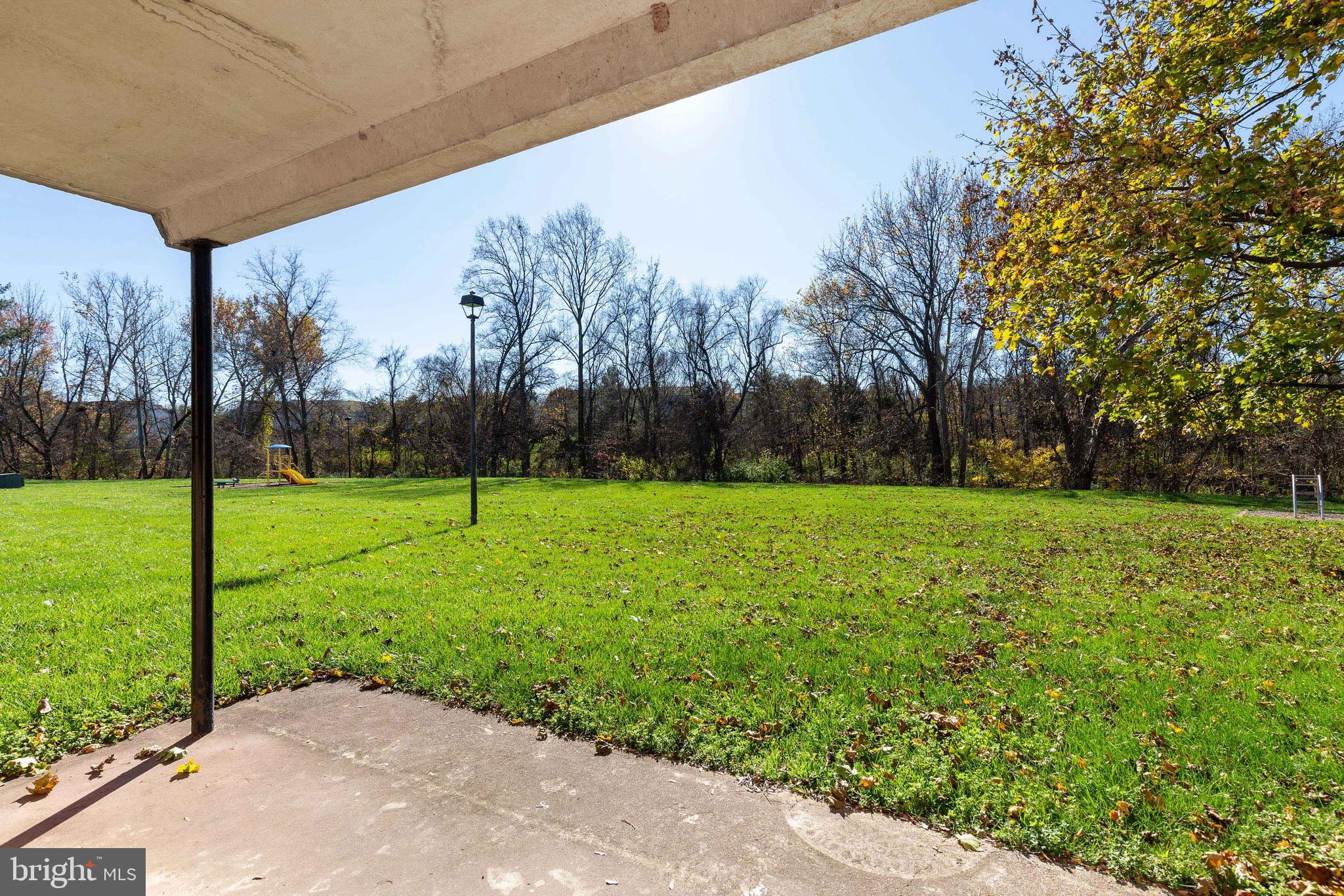 14577 Golden Oak Road Centreville, VA 20121 - Photo 31 of 36 The patio has a beautiful wooded view.