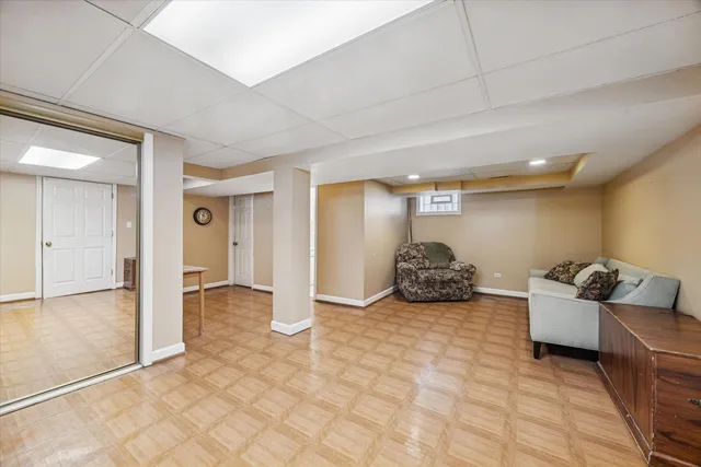 a view of a livingroom with furniture and toys