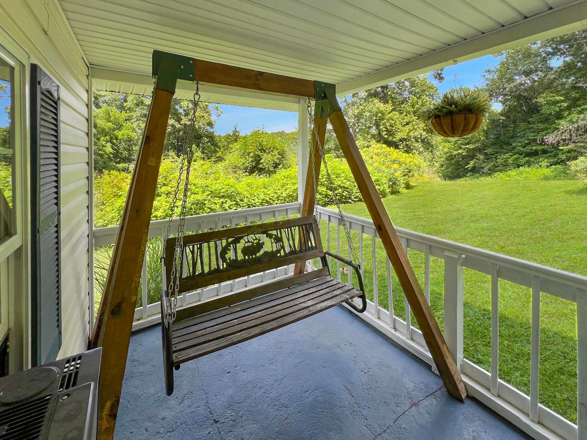 988 Connett Road Nelsonville, OH 45764 - Photo 4 of 28 Spend hours enjoying nature from the front porch