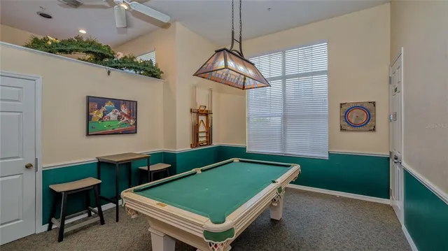 a room with furniture and screen