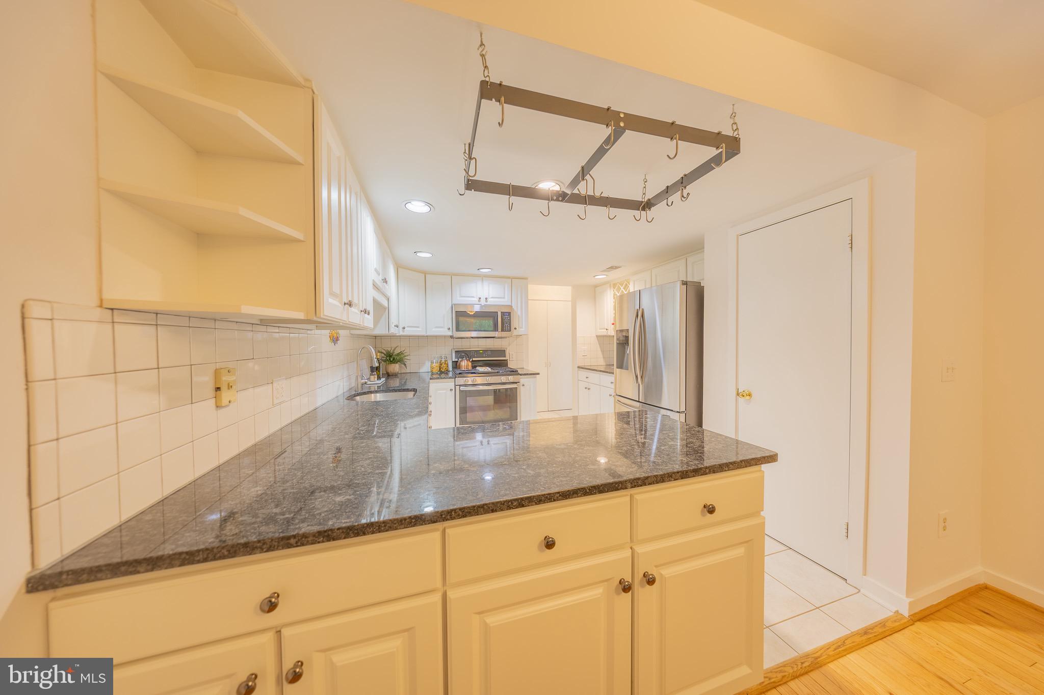2201 Cedar Cove Court Reston, VA 20191 - Photo 8 of 25 Well-appointed kitchen with abundant cabinetry