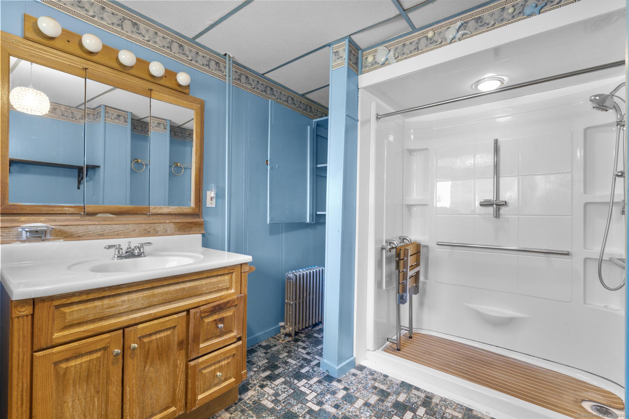 13 French Street Ansonia, CT 06401 - Photo 15 of 40 a bathroom with a sink a toilet and shower