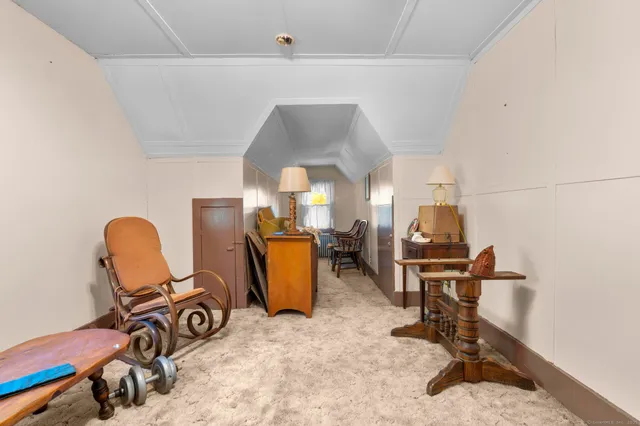 a view of a workspace with furniture