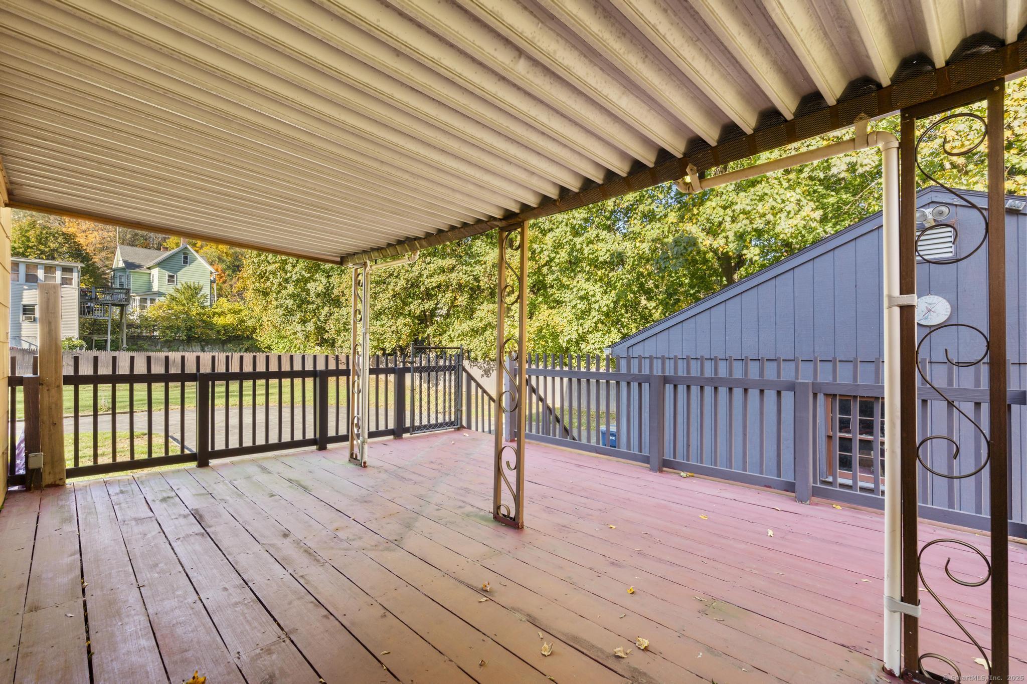 13 French Street Ansonia, CT 06401 - Photo 32 of 40 a porch with wooden floor in outdoor space