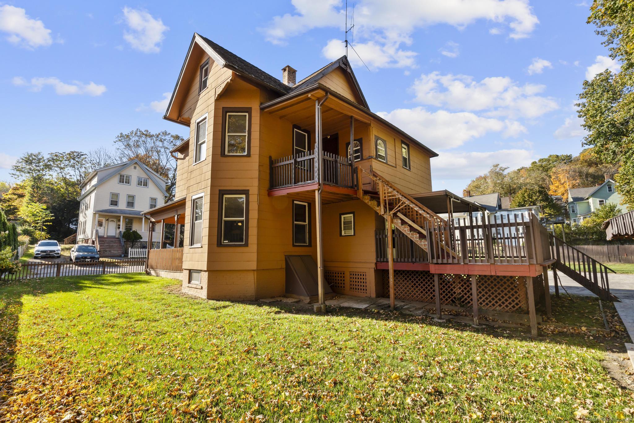 13 French Street Ansonia, CT 06401 - Photo 37 of 40 a front view of a house with a yard