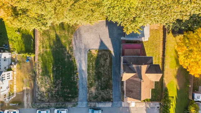 front view of a house with a trees