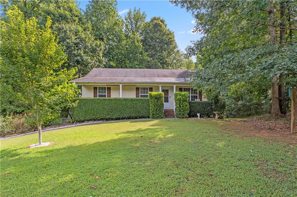 105 Hunters Ridge Court Covington, GA 30014 - Photo 1 of 1 a house view with a outdoor space