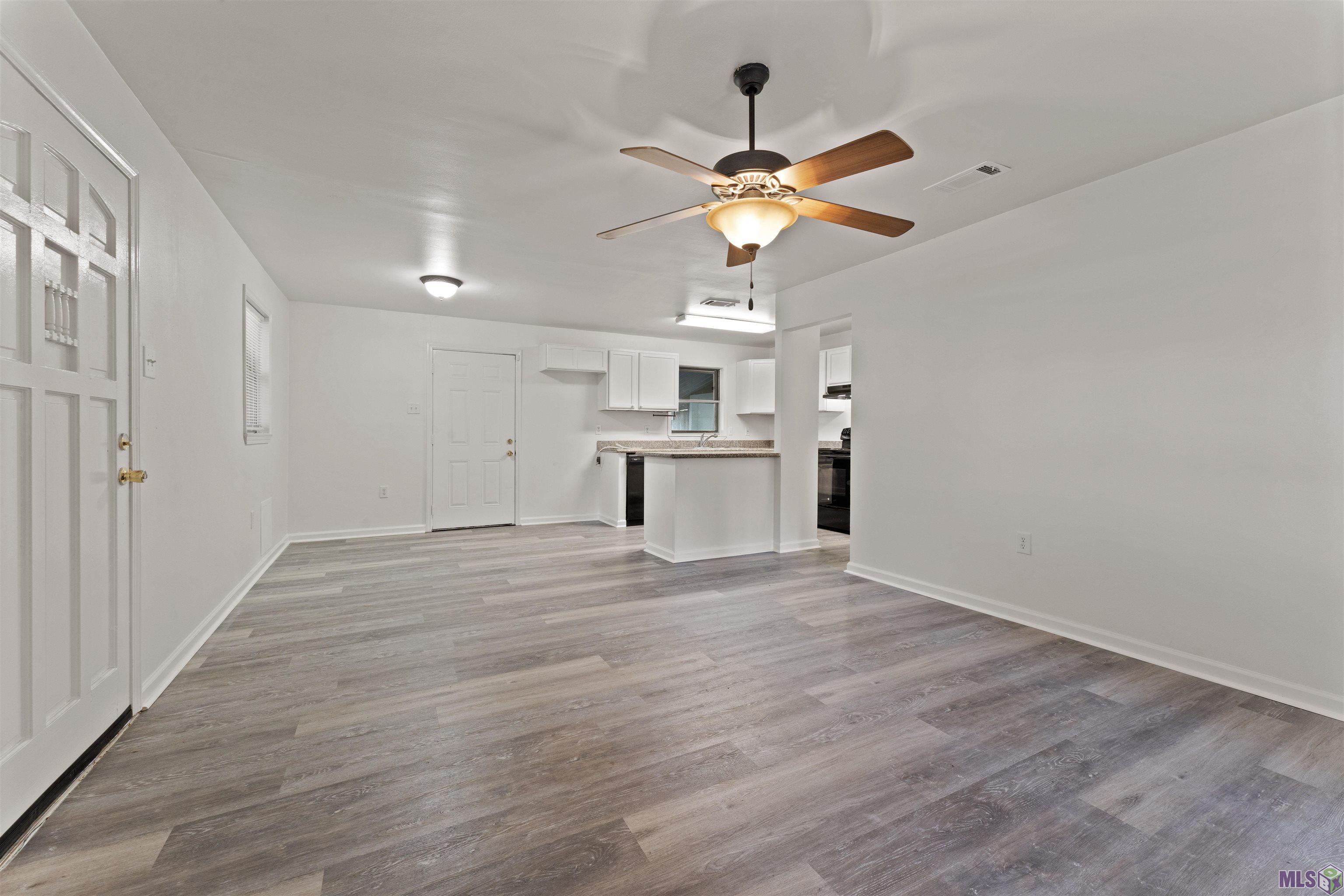 9145 Bordeaux Drive Baton Rouge, LA 70809 - Photo 10 of 23 Den open to Kit/Dining