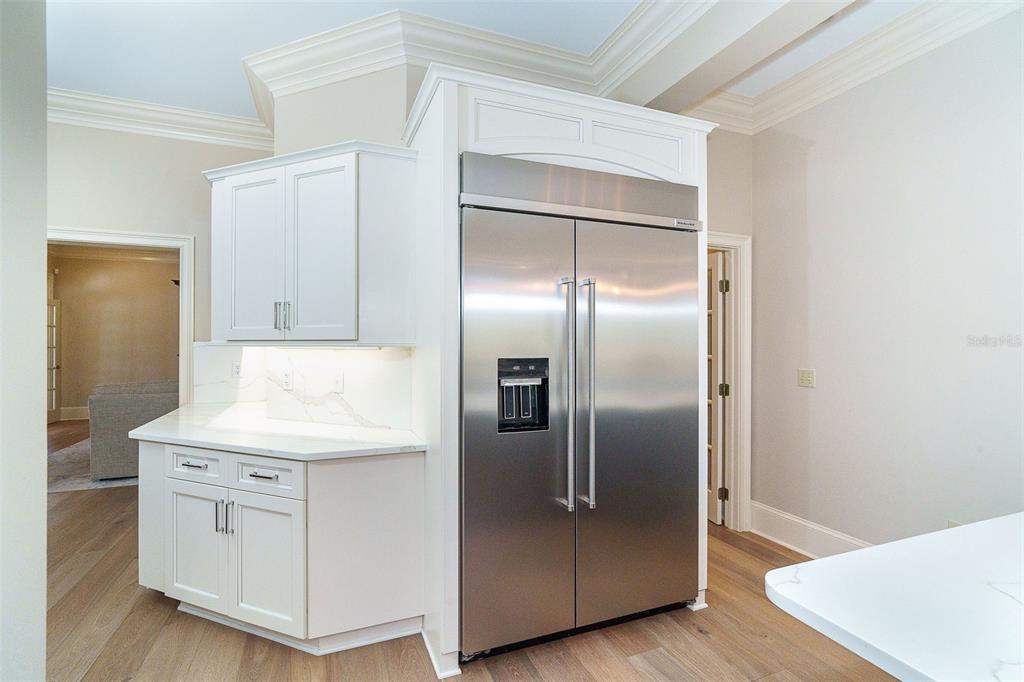 9299 Southwest Lipe Road Arcadia, FL 34269 - Photo 15 of 68 a kitchen with cabinets and stainless steel appliances