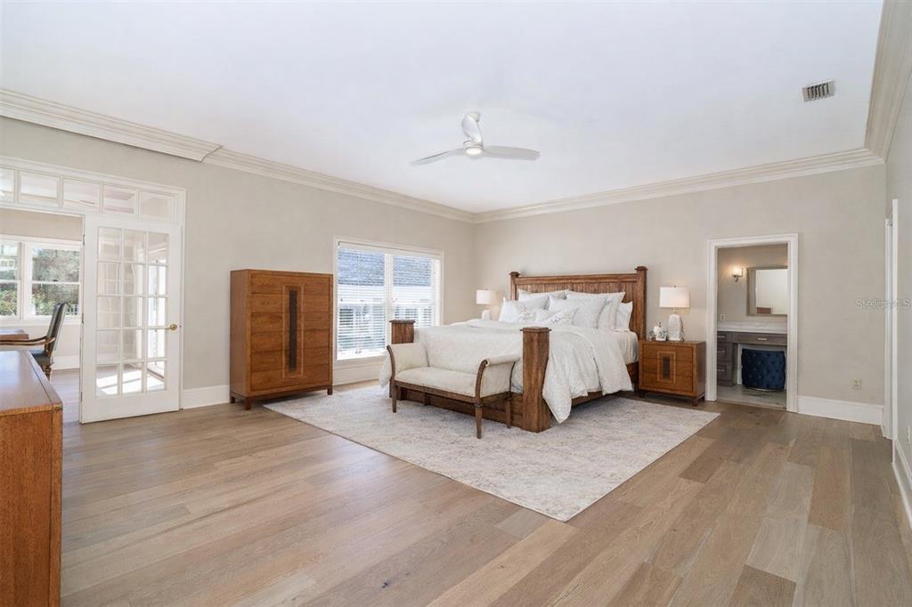 9299 Southwest Lipe Road Arcadia, FL 34269 - Photo 20 of 68 a spacious bedroom with a bed and furniture