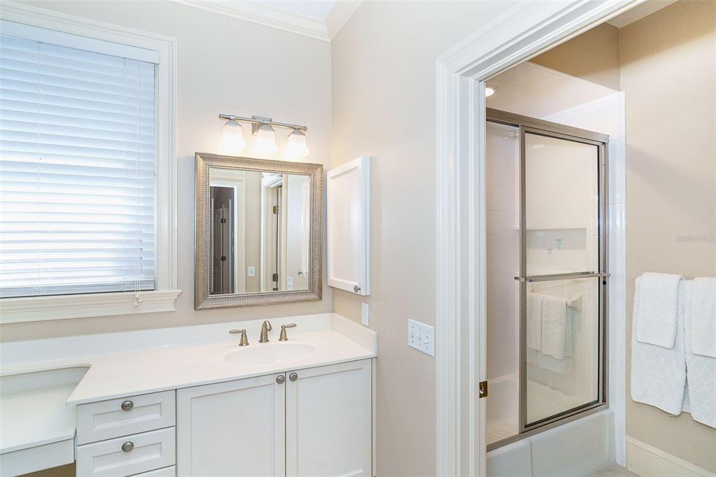 9299 Southwest Lipe Road Arcadia, FL 34269 - Photo 31 of 68 a bathroom with a sink and a mirror