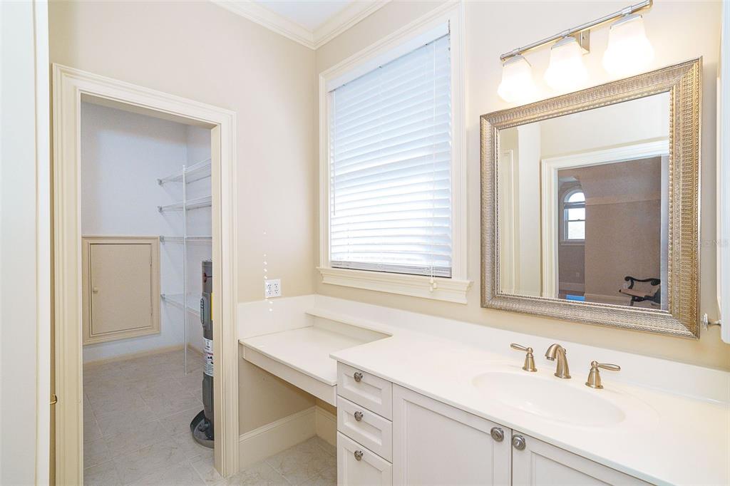 9299 Southwest Lipe Road Arcadia, FL 34269 - Photo 32 of 68 a bathroom with a sink and a mirror