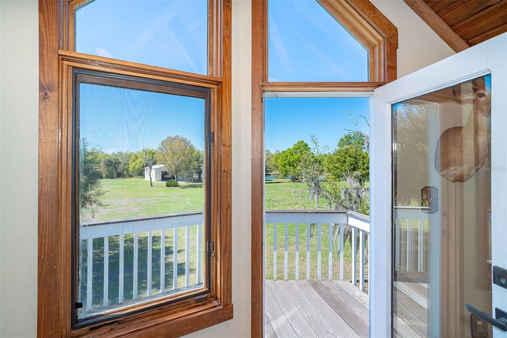 9299 Southwest Lipe Road Arcadia, FL 34269 - Photo 48 of 68 a view of a door and a window