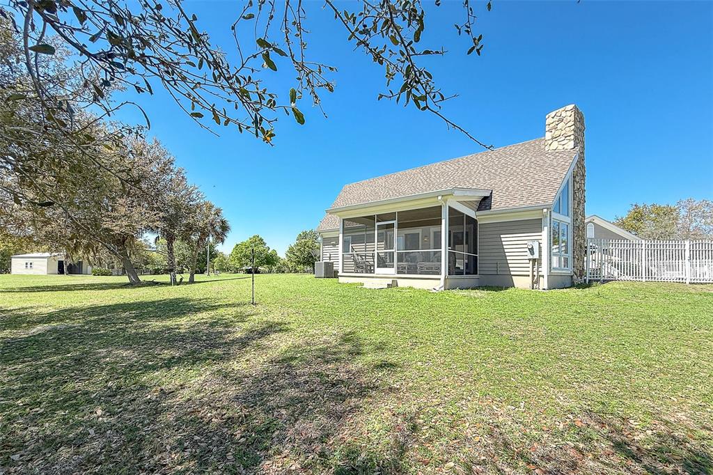 9299 Southwest Lipe Road Arcadia, FL 34269 - Photo 50 of 68 a view of a house with a backyard