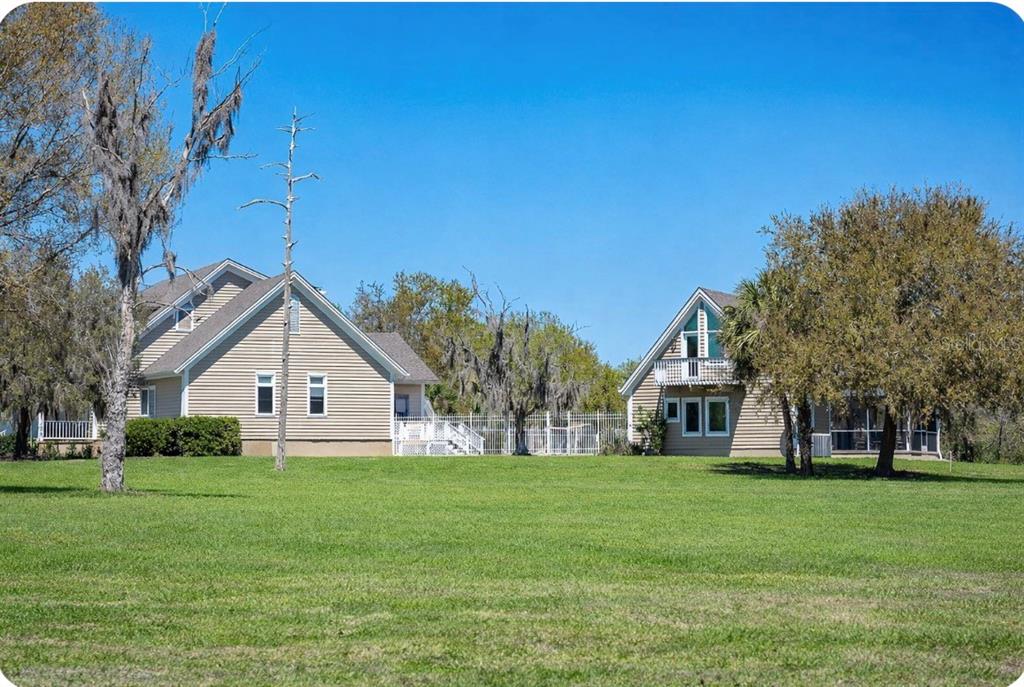 9299 Southwest Lipe Road Arcadia, FL 34269 - Photo 51 of 68 a view of house that has a yard