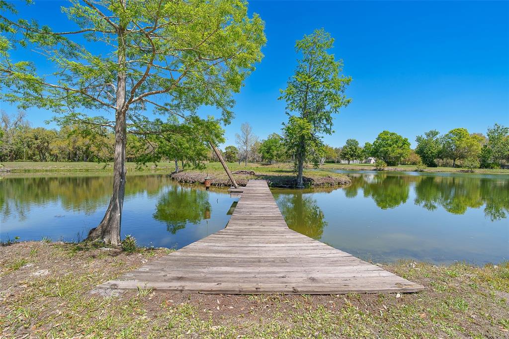 9299 Southwest Lipe Road Arcadia, FL 34269 - Photo 54 of 68 a view of a lake with houses