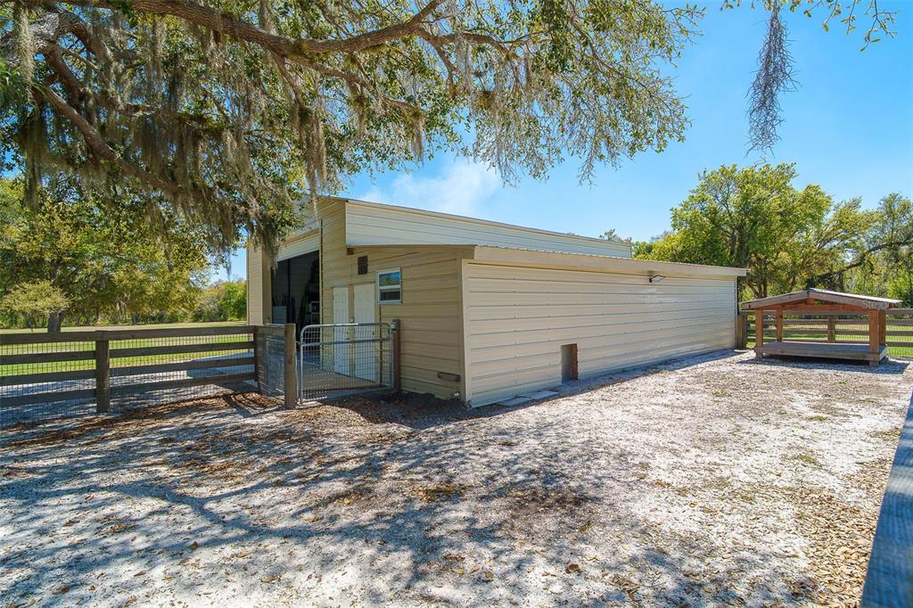 9299 Southwest Lipe Road Arcadia, FL 34269 - Photo 59 of 68 a view of a house with a yard
