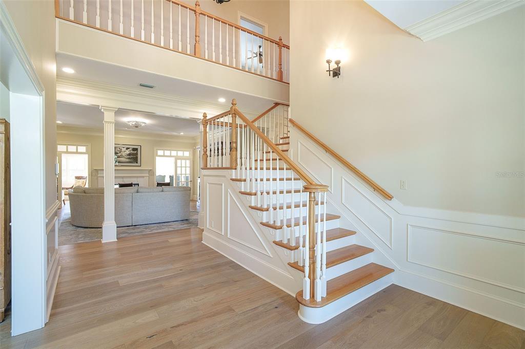 9299 Southwest Lipe Road Arcadia, FL 34269 - Photo 6 of 68 a view of entryway and hall with wooden floor