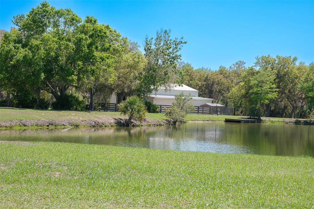 9299 Southwest Lipe Road Arcadia, FL 34269 - Photo 61 of 68 a view of a lake with houses