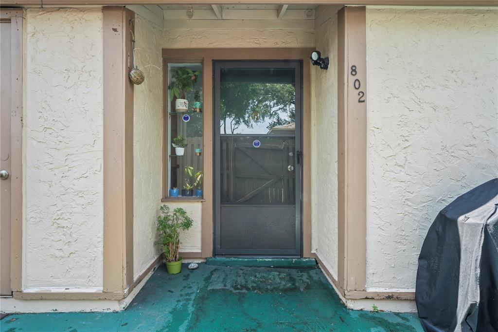 802 Antler Court Brandon, FL 33511 - Photo 24 of 37 a view of a front door of a house with a yard