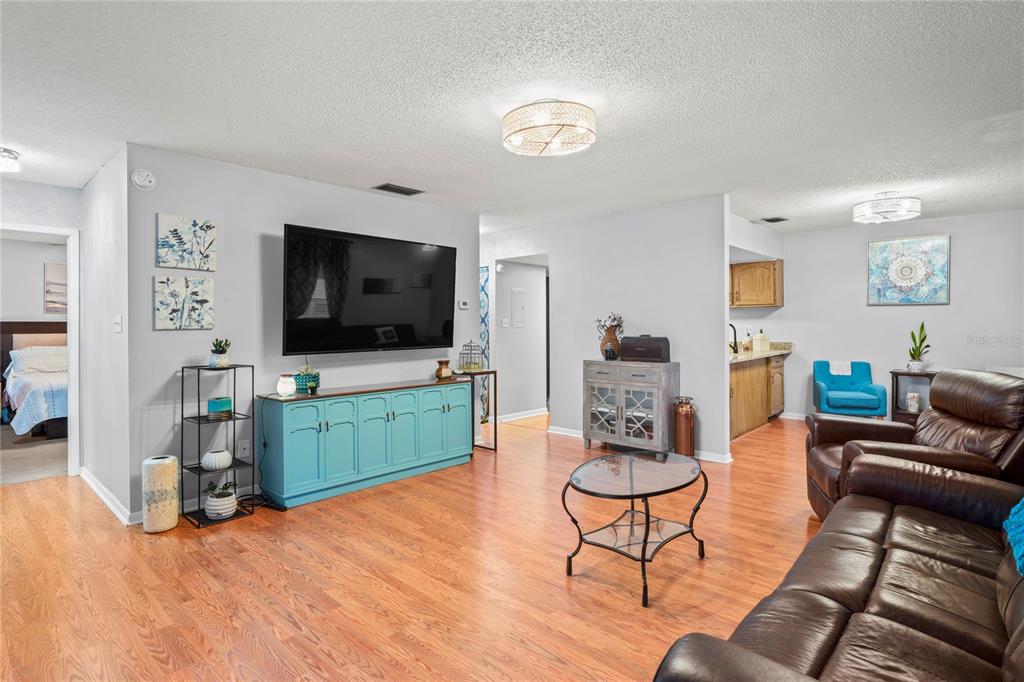 802 Antler Court Brandon, FL 33511 - Photo 3 of 37 a living room with furniture and a flat screen tv