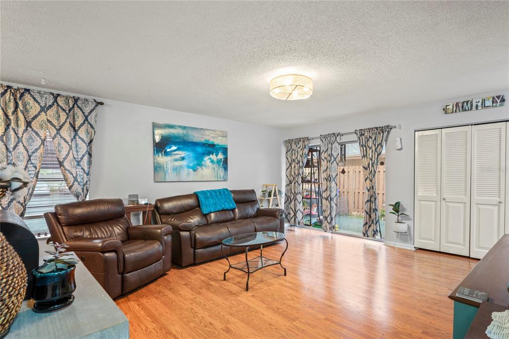 802 Antler Court Brandon, FL 33511 - Photo 4 of 37 a living room with furniture and wooden floor